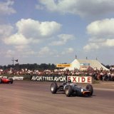 Graham Hill - BRM P57 leads Luigi Bandini - BRM