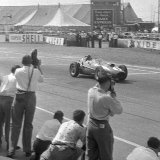 RF 242 - Peter Collins - Ferrari - crossing the finishing line